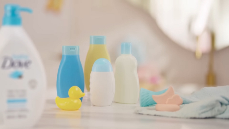 A set of gentle skincare products for children, including lotions, soaps, and baby bottles