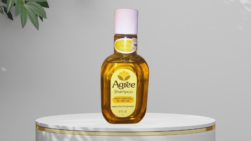 Vintage Agree Shampoo bottle labeled for oily hair